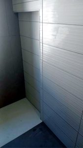 Tiled corner niche